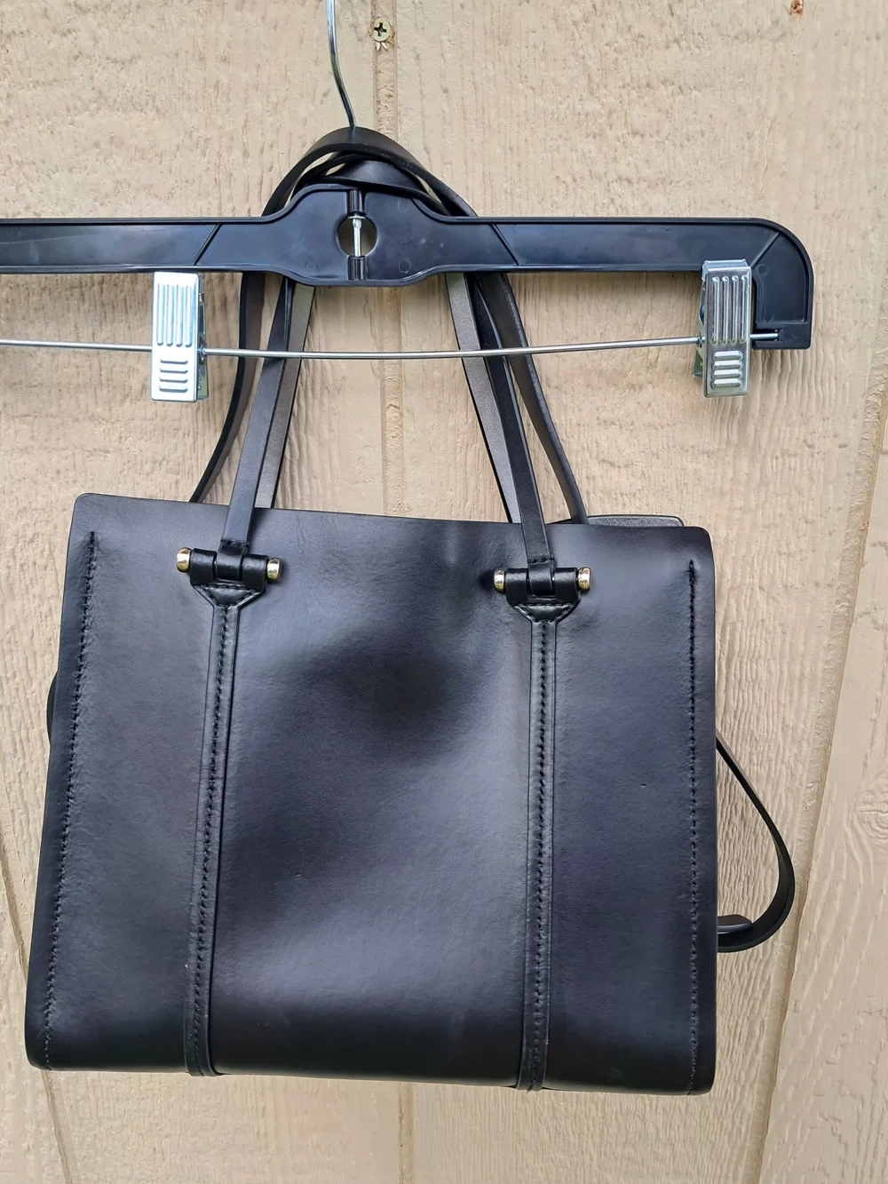 Kate Spade New York black leather tote bag with shoulder strap​